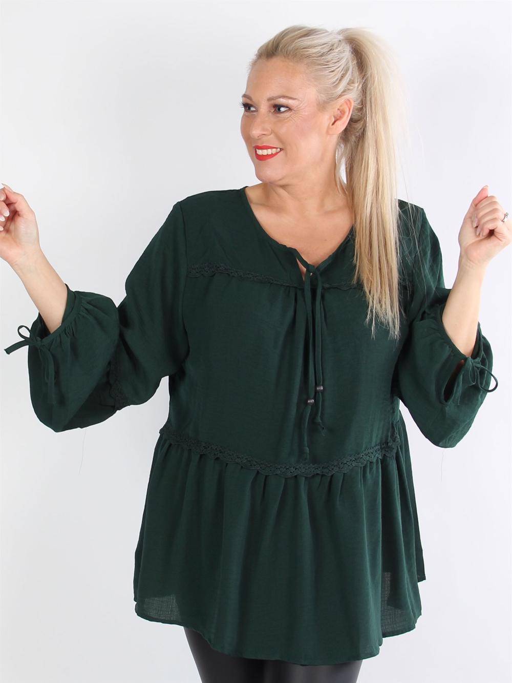 Lilja - Svart tunika med band i halsen och på ärmarna